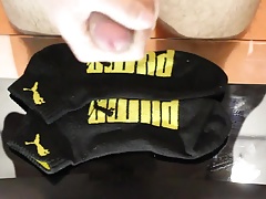 Cum on black Puma socks