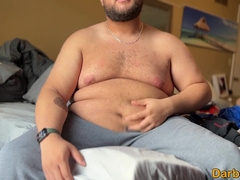 Humungous guy showcasing off his ample abdomen and dude mounds to you