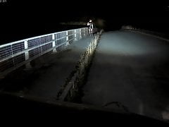 Walking over a bridge and get caught