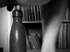 Guzzles bottle deep in my bum