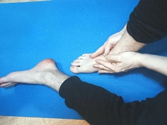 The dude gropes his soles with lubricant