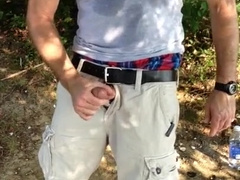 Public getting off in the forest - fapping off by the water and spunking.
