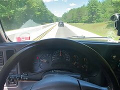 Stroking my cock while cruising down the highway