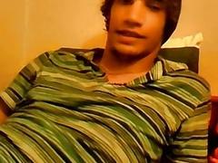 Young man tugs on his hard dick solo