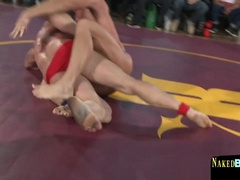 Defined Boys Grappling In Front Of Audience