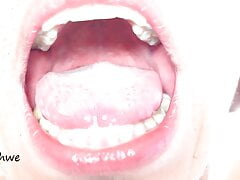 Delicious wide open mouth with lots of saliva