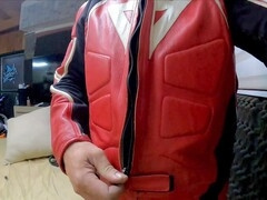 Fit guy in leather suit does a sexy striptease and masturbation with his giant cock