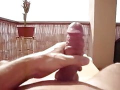 Masturbation on the balcony in the sun.