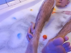 Young homo. With a XXL man rod. Uber-Cute soles. Wanking off in a red-hot bathtub. (Part two)