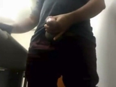 Brazilian Daddy Strokes His Big Uncut Cock at Work 3