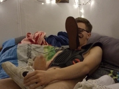 Young teenager masturbates off his dick and splashes on the sneaker