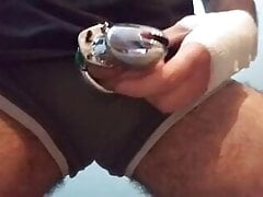 Shaking and slapping my locked up cock and balls