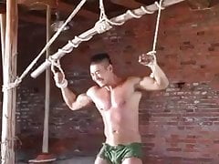 Chinese muscle guy gets whipped