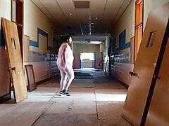 Mofo2121 walks around an abandoned school naked
