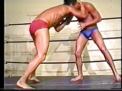 Two hard body hunks fight on the rink then have a shower