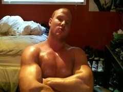 Hot young muscle hunk shows off his pecs