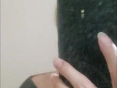 A femboy stroking in front of the mirror