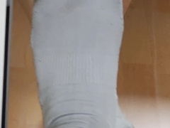 Take off perspiring mild socks and hand job jizz flow on feet with rubdown.
