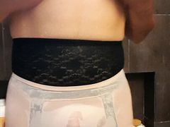 Full cut nylon panties and D cup pink bra under the shower