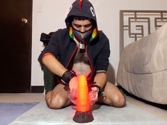 Guy with the dragon-themed pleasure stick ready for action