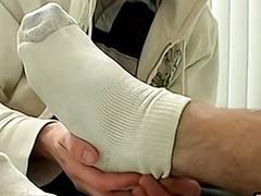 Twink has his feet massaged before being dicked down hardcore