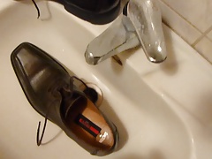 Piss in men's dress shoe