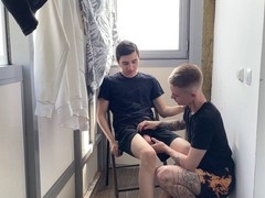Two young guys get it on in the balcony