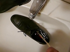 Piss in men's dress shoe