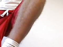 Macho jock with a foot fetish undresses