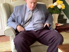 Well dressed 65 year old strips off pants and masturbates