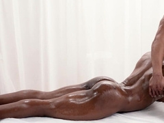 Blessing his booty and body after pouring lube over him