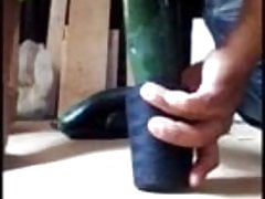 Gozando  de un enorme pepino en el culo