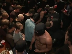 Group Sex - Captured stud is being used in a bar full of horny masked men