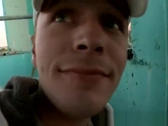 Gay couple making love at a balcony