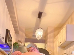 Large coach pees after the game in his white trunks