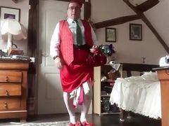 In outfit with a skirt and a red vest for a night out