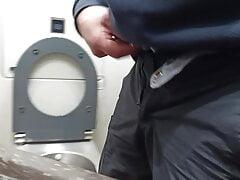 pissing in a public toilet on train