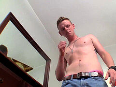 Lights up and crushes back on the couch as he masturbates big meat