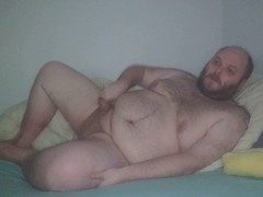 Lazy afternoon on November 25th - round three, Another time relaxing on my couch, revealing my physique