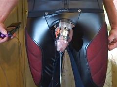 Estim cum load in chastity