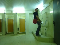 Stud attempting to get Caught Fapping Off in Public Rest Room