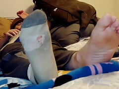 Just Chilling on the Bed and taking my Socks off
