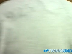 Two amateur cuddling in their underwear while wanking cock