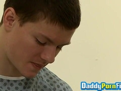 Mature man playing with twink and giving him oral and handy