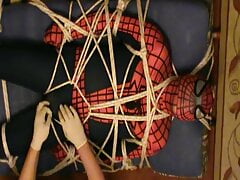 Restrained spiderman gets an enjoying