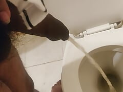 Indian black dick men peeing in the toilet