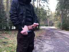 Stud with ample boner jacking and nutting near the street