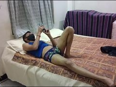 Adorable desi guy in a playful mood showing off in lingerie