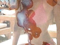 Cumshot on pretty girl on pink bikini