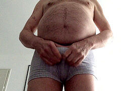 undressing.stroking and rod and balls slapping til cumming!
